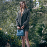 Borsetta Sibilla in pelle intrecciata